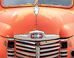 Close-up of the front of a late 1940's weathered International Harvester KB-5 pickup truck.