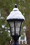 A light post covered in fresh snow in Ridgecrest, CA.