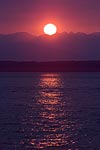 Sunset over the Olympic Mountains and Puget Sound.  Seattle, WA.