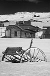 An old wagon burried in the snow in Bodie, CA.